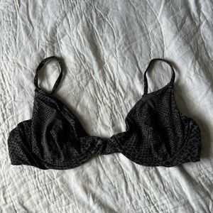 Black snake lining Manhattan top